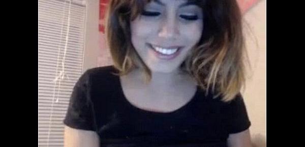  Camgirl showing her big tits while she smile